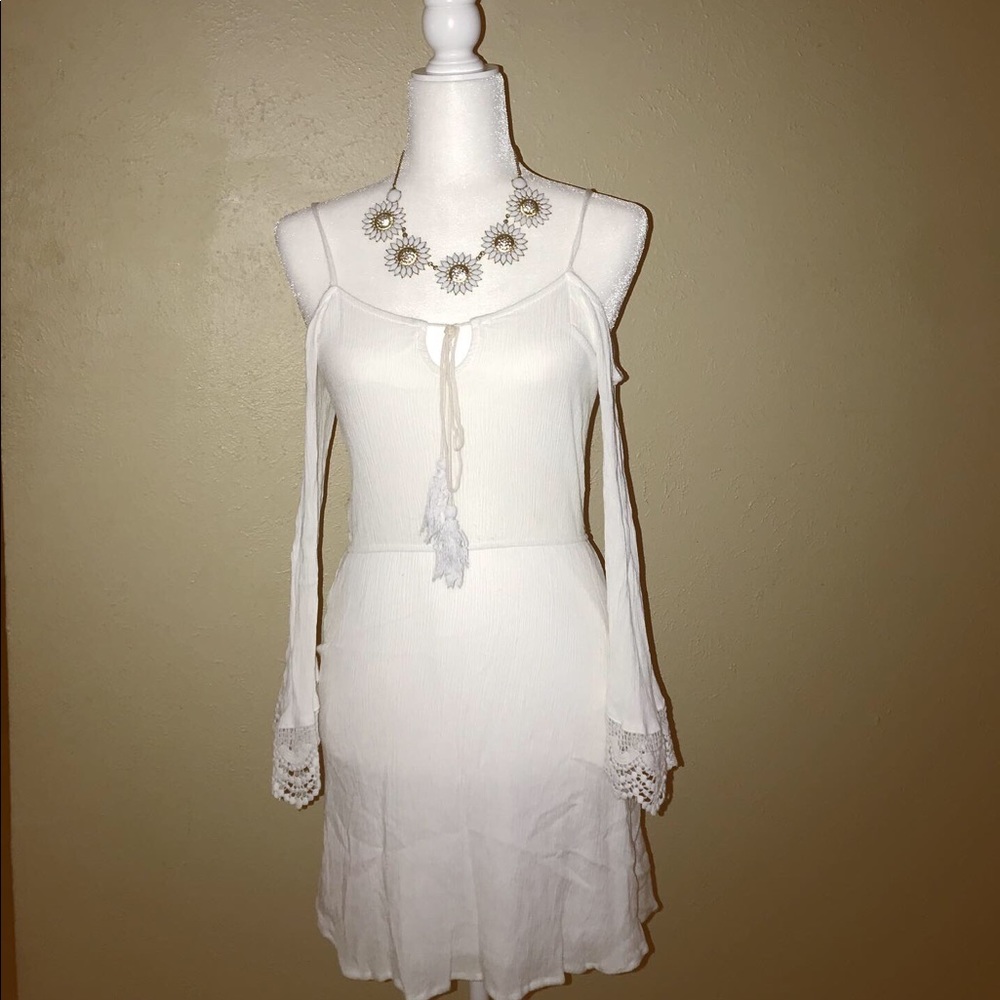 White dress with crochet sleeves